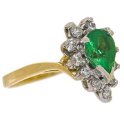 18ct gold. pear shaped. emerald and. 11 diamond ring. 1960s. Click for more information...