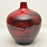 Royal Doulton. Flambe Woodcut Vase. Click for more information...